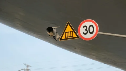 The middle shot of a train passing sign under Shanghai elevated road Stock Footage 95839243