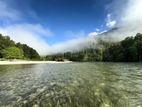 Middle of Skagit River view during summer season Washington state with Casc.. Stock Photos