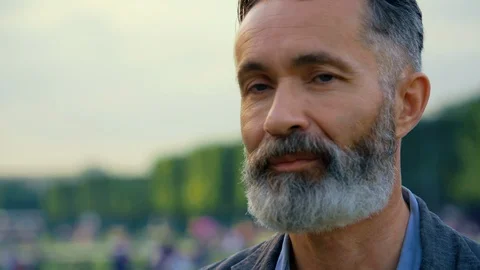 Middleaged good-looking man looks confident in the Eiffel TowerPark Stock Footage 120164694