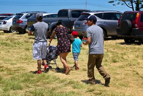Middlefield, CT USA. Jun 2019. Hispanic family happily heading home with thei Stock Photos