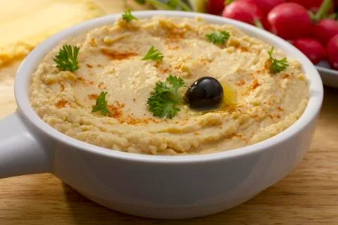Middles eastern hummus or chickpea dip Stock Photos