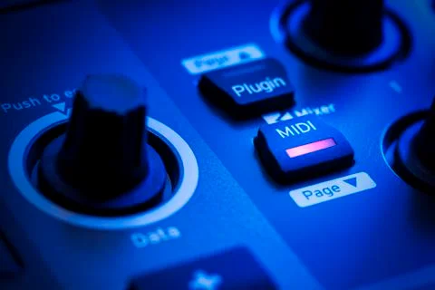 Midi button on a controller keyboard Stock Photos