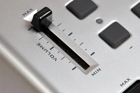 Midi keyboard controller close up with faders wheel buttons and knobs pitch, Stock Photos