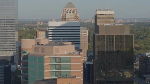Midlevel view of office high-rises track right to reveal downtown St. Stock Footage 120778452