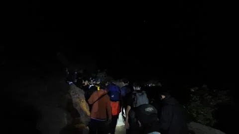 Midnight Ascent Through Ijen Crater With Headlamps Stock Footage 345144642