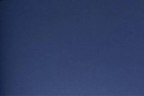 Midnight blue paper background with a smooth, matte texture and subtle grainy 스톡 사진
