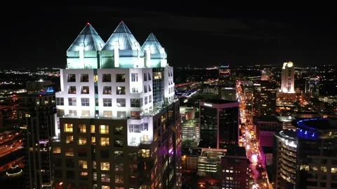 Midnight drone flight over downtown Orlando Florida displaying bright lights Stock Footage 344583503