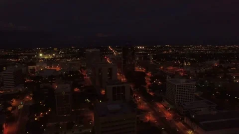 Midnight drone flight over downtown Tucson Arizona showcasing city scene Stock Footage 344719681