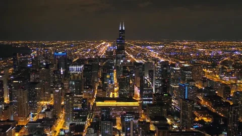 Midnight drone flight over downtown Chicago Illinois showcasing city scene Stock Footage 344779700