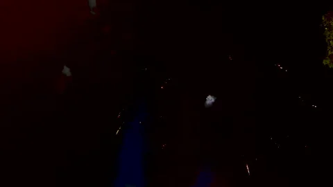 Midnight Magic: Explosive New Year's Fireworks Painting the Night Sky Stock Footage 255329398