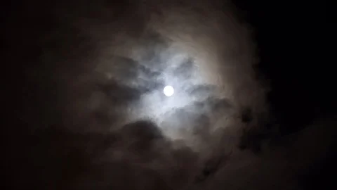 Midnight moon on night sky. Moon between gray cumulus clouds. Werewolves time. Stock Footage 108013965