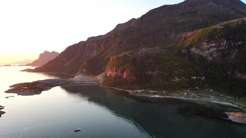 Midnight sun Norway Mjelle mountains and sea Stock-Footage 321771253