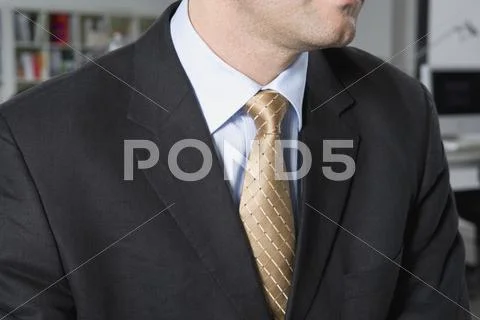 Midsection of a businessman Stock Photos