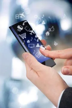 Midsection of businessman using smart phone with various icons 스톡 일러스트
