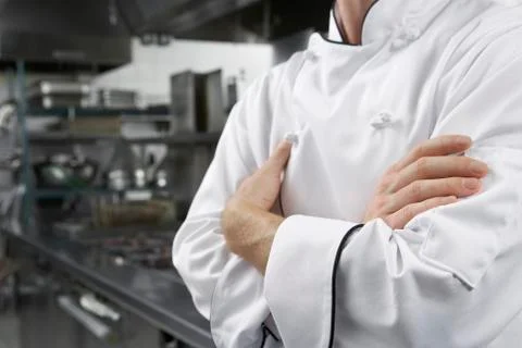 Midsection Of Chef With Arms Crossed Stock Photos