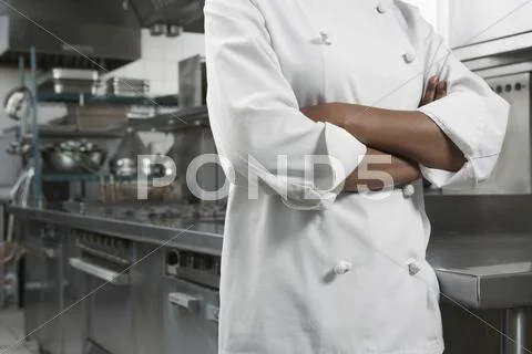 Midsection Of Chef With Arms Crossed Stock Photos