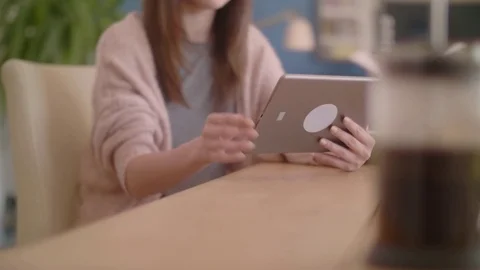 Midsection of female hipster is blogging through digital tablet Stock Footage 79659193