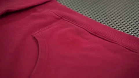 Midsection of female worker standing at workplace with professional dry cleaning Stock Footage 154149513