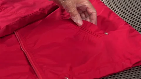 Midsection of female worker standing at workplace with professional dry cleaning Stock Footage 154149550