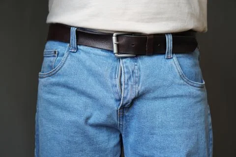 Midsection of man dressed in jeans with open fly Stock Photos