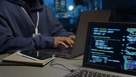 Midsection of Unknown Black Web Developer Programming on Laptop at Work Table Stock Footage 329616788