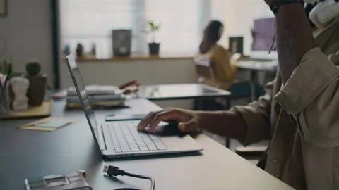 Midsection of Unrecognisable Male Developer Drinking Coffee at Work Desk Video stock 299245455