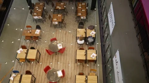 In the Midst of a Busy Day, Half an Empty Cafe. View From Above Stock Footage 73493161
