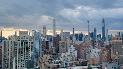 Midtown Development Day to Night Cloudscape Stock Footage 115667497