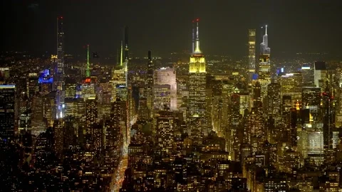 Midtown Manhattan with Empire State Building at night - street photography 動画素材 234564458