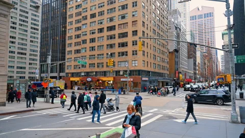 Midtown Manhattan intersection at West 55th Street Stock Footage 333848859