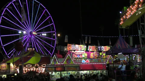 Midway Crowds With Ferris Wheel Stock Footage 32202279