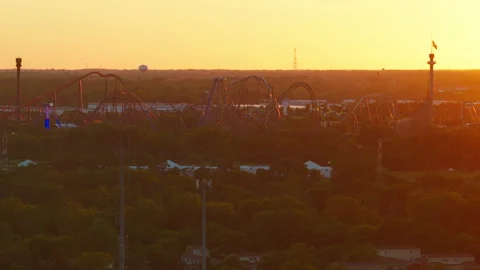 Midwest summer thrill destination skyline at glowing sunset. Stock Footage 345999489