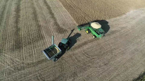 Midwestern Farmer Harvesting Soybeans Aerial w/ John Deere Stock Footage