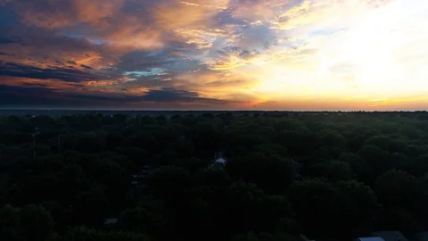 MidWestSunSetoverTrees Stock Footage 98264912