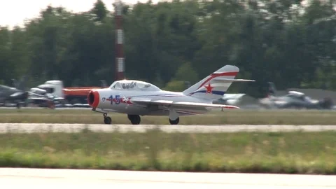 MiG-15UTI (NATO codification: Midget) moves to runway for takeoff. Stock Footage 117541845