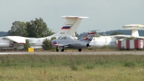 MiG-15UTI (NATO codification: Midget) accelerates on runway and takes off. Stock Footage 117541876