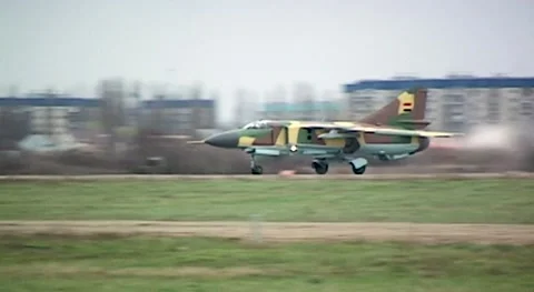 MiG-23 fighter accelerates with afterburner and takes off. Syrian Air Force Stock Footage 142008681
