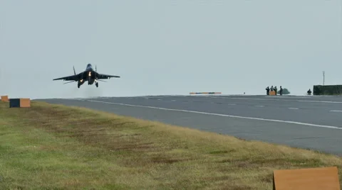 MiG-29 flies low over the road Stock Footage 55252612