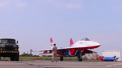 MiG 29 prepares for flight and radar in background on airshow Wings of Parma Stock-Footage 58534667