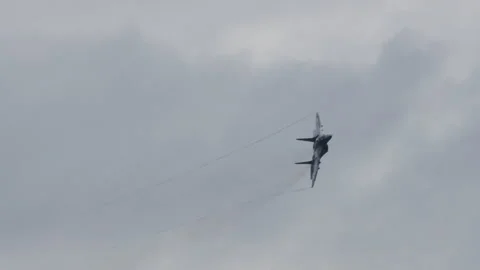MiG29 Polish AirForce does war air defense combat maneuver in flight Stock Footage 172185402
