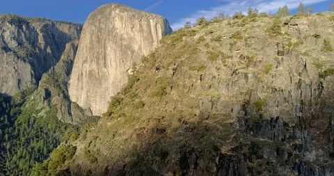 Mighty El Capitan raises over the park. 스톡 동영상 116732780