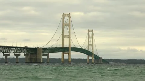 The Mighty Mackinac Bridge on cloudy day - the classic angle Stock Footage 10832003