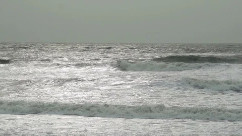 Mighty waves as storm crashes on sandy beach Video stock 72481934