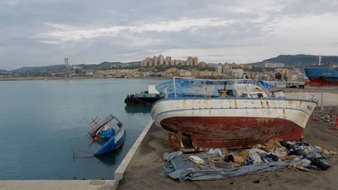 Migrant boats stranded Stock Footage 108635308