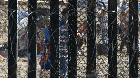 Migrant caravan for asylum at the Mexico/U.S. border, Tijuana. Stock Footage 98950324