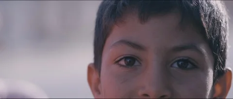 Migrant child close-up face Video stock 104722599