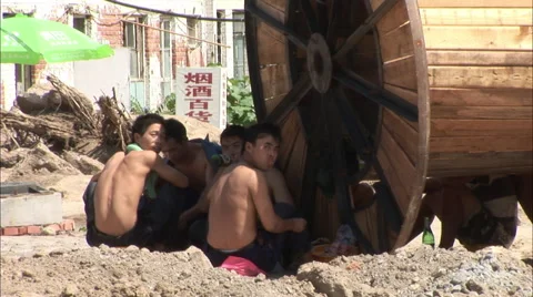 Migrant construction workers at lunch, China Stock Footage 56591407