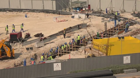 Migrant laborers at work on a construction site in Doha, Qatar Video stock 50323844