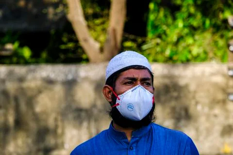 Migrant worker wait outside CSMT railway station Stock Photos