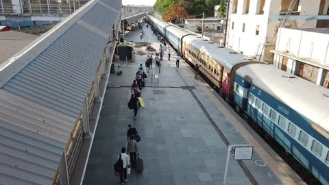 Migrant workers Covid 19 Lockdown India special Train Bus back home police duty. Stock Footage 130796766